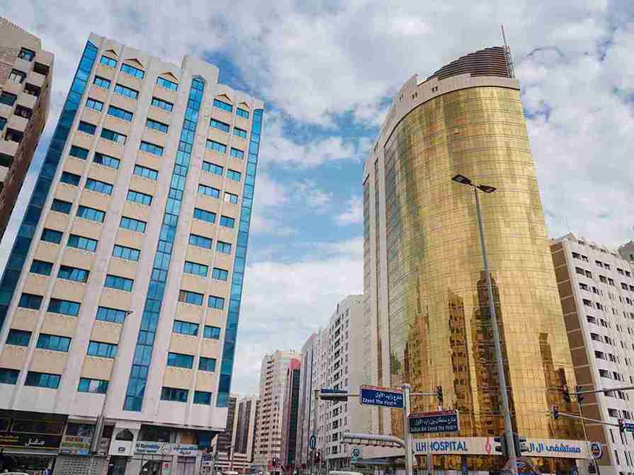 Abu Dhabi, UAE - March 19, 2023: skyscrapers of Abu Dhabi city skyline with beautiful clouds